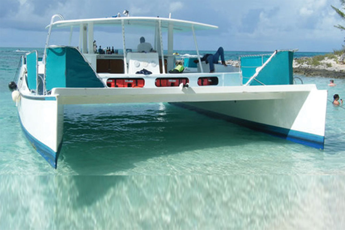 People having fun celebrating on a private party catamaran charter in Miami